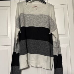 Women’s sweater by Andree. This is a size large.